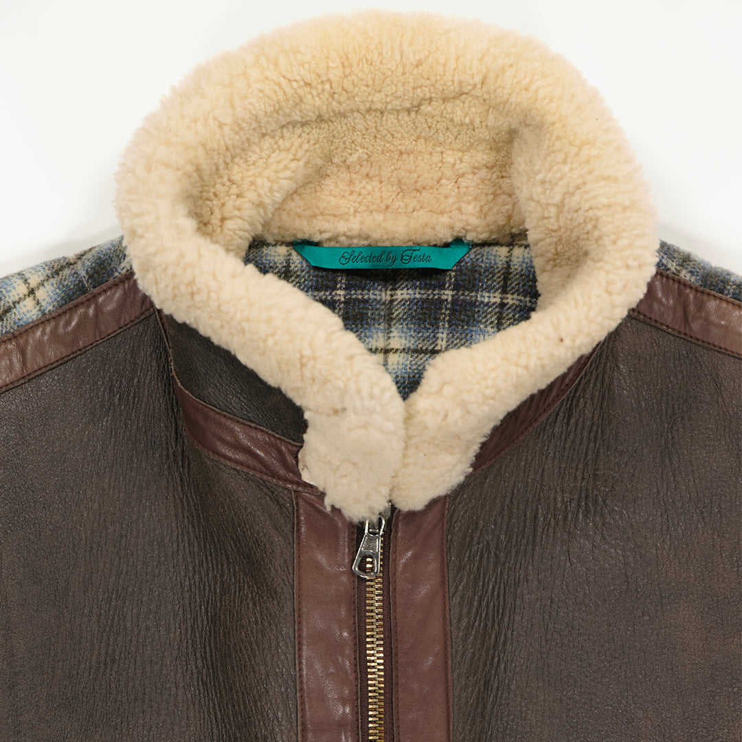 Sleeveless sheepskin bomber jacket